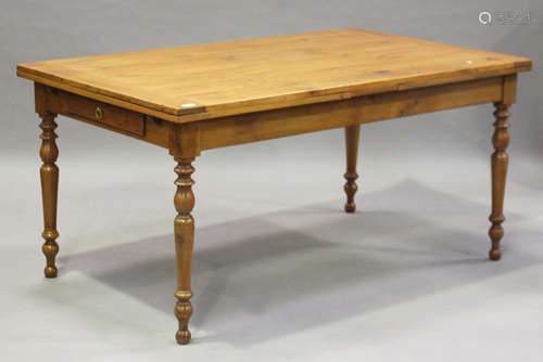 A 20th century French cherry draw-leaf dining table, raised on turned legs, height 76cm, extended