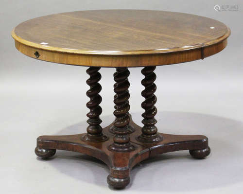 A Victorian mahogany 'D' end extending dining table with two extra leaves, the barley twist supports