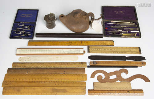 A group of mixed collectors' items, including a selection of technical drawing instruments, a