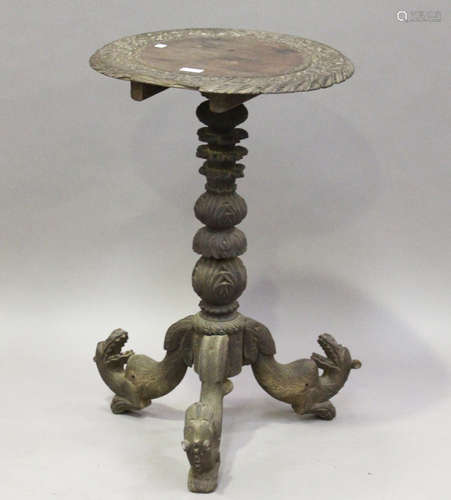 A 19th century Indian hardwood tip-top wine table, the multi-knop stem raised on tripod legs, height