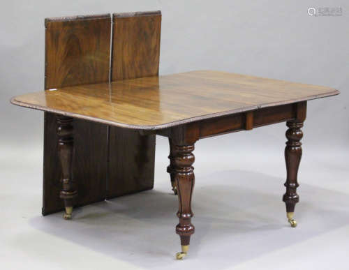 A William IV mahogany extending dining table, in the manner of Gillows of Lancaster, the pull-out