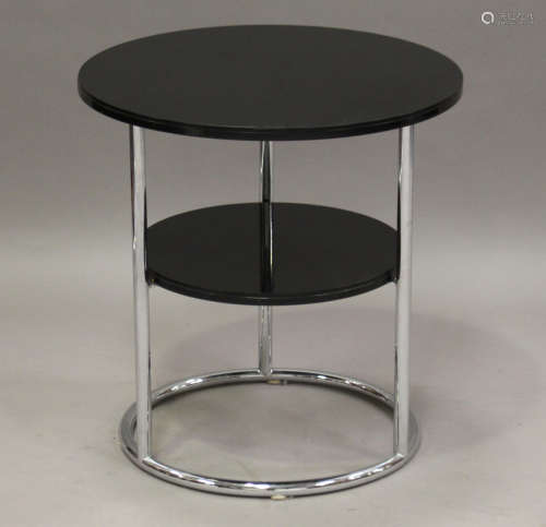 An Art Deco black glass and chromium plated circular two-tier table in the manner of Heals, on