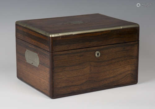 A George IV rosewood and nickel mounted travelling vanity case, the sides with recessed handles, the