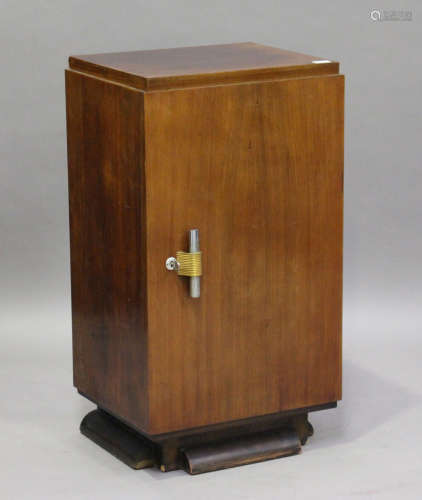 An Art Deco hardwood side cabinet, the door enclosing five drawers, height 91cm, width 50cm, depth