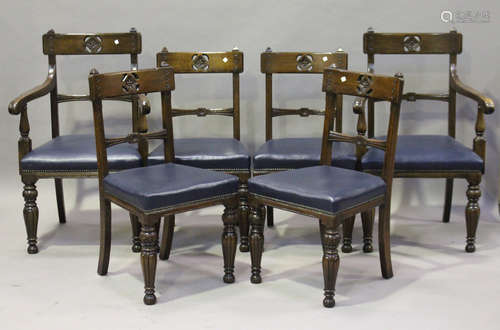 A set of eight modern Victorian Gothic Revival style carved oak dining chairs, comprising two