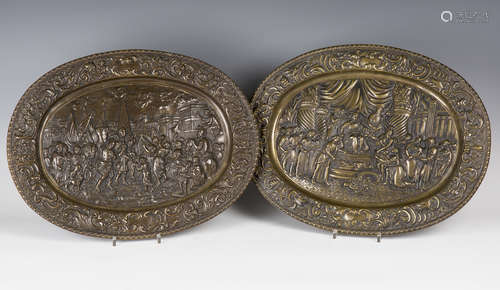 A pair of 19th century Continental cast bronze oval ornamental plaques, both depicting Classical