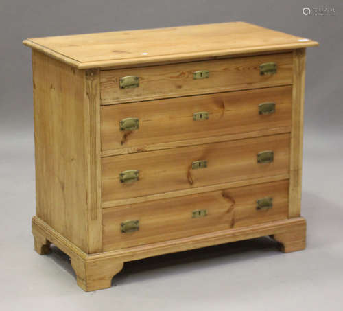 An early 20th century Continental pine chest of four graduated long drawers, on bracket feet, height
