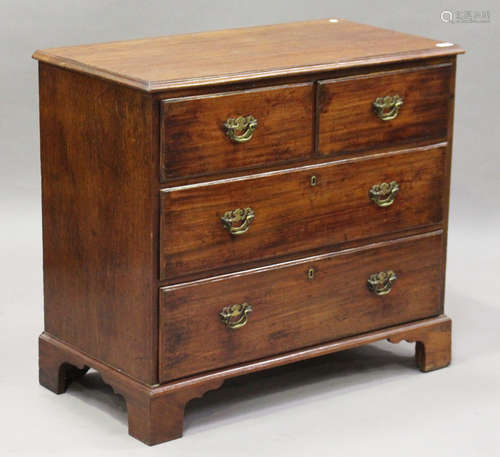 A George III mahogany chest of two short and two long drawers, height 81cm, width 91cm, depth 47.