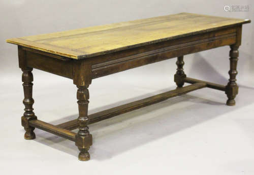 A 19th century French walnut refectory table, raised on turned and block legs, height 75cm, length