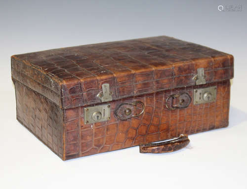 An early 20th century crocodile skin case with nickel plated fittings, height 19cm, width 45cm (