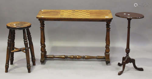 A Victorian walnut rectangular games table, the top inlaid with a chessboard, height 60cm, width