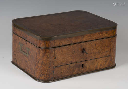 A 19th century Colonial burr walnut and brass bound campaign dressing box of curved rectangular