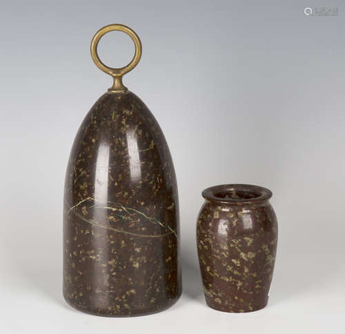 A late Victorian serpentine doorstop of ovoid form, probably Cornish, fitted with a brass ring