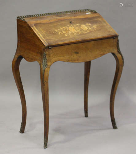 A late 19th century French kingwood bureau du dame with gilt metal mounts and boxwood foliate inlaid