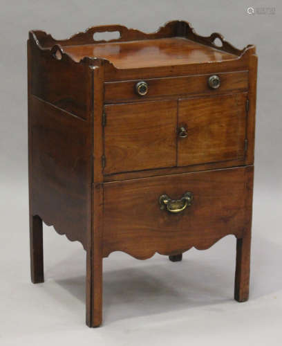 A George III mahogany night cupboard, the galleried top above two drawers and a cupboard, height