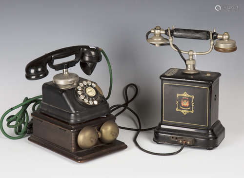 An early 20th century Belgian black enamelled telephone by Jydsk, height 32cm, width 25cm,