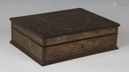 A 19th century hardwood and embossed leather box, in the manner of César Bagard, the lid and sides