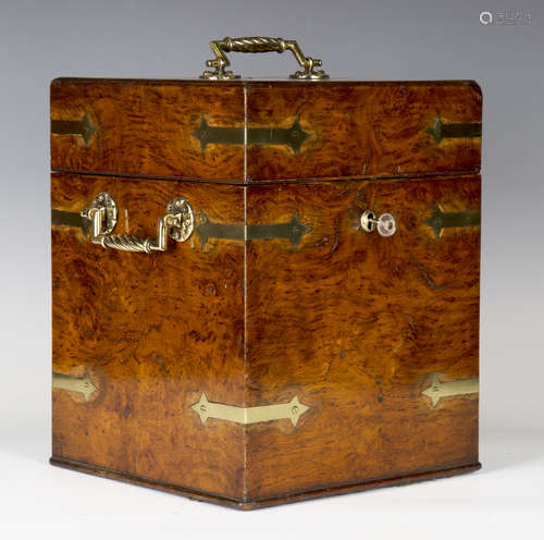 A Victorian Gothic Revival pollard oak and brass bound four-bottle decanter box, the lid interior