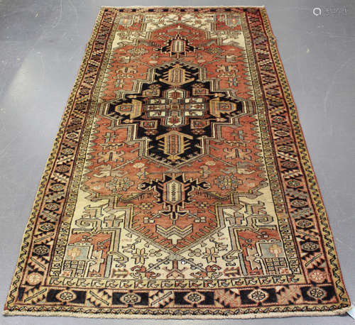 A Heriz carpet, North-west Persia, mid-20th century, the faded pink field with a large angular