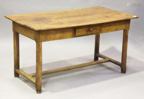 An 18th century French provincial fruitwood farmhouse table, the three-plank top above a single