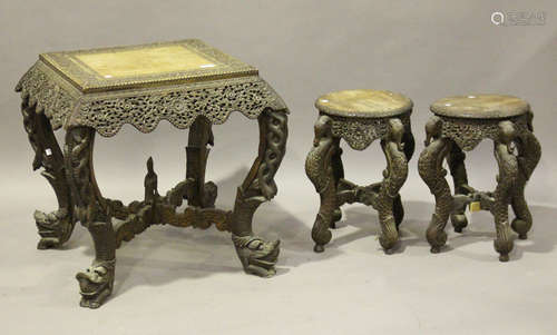 A late 19th century Burmese carved hardwood centre table with a pierced foliate frieze, height 66cm,