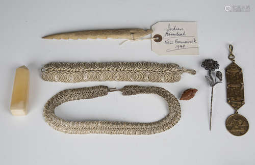 A small group of mixed collectors' items, including a Chinese carved nut, length 3cm, a North