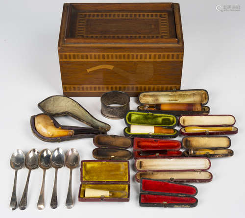 An early 20th century mahogany and inlaid smoker's box, width 20cm, a group of leather cased cheroot