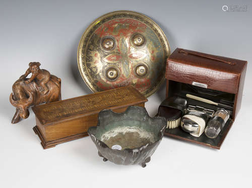 A selection of collectors' items, including an early 20th century leather cased vanity set, a