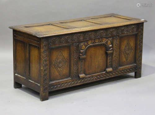 A mid/late 20th century Jacobean Revival oak panelled coffer, height 63cm, width 137cm, depth 54cm.