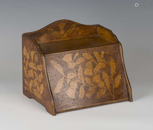 A late Victorian Arts and Crafts pokerwork stationery box, the gallery back, sloping front and sides