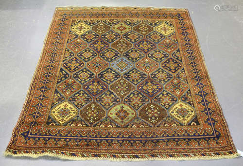 An Afshar rug, South-west Persia, early/mid-20th century, the compartmentalized polychrome field