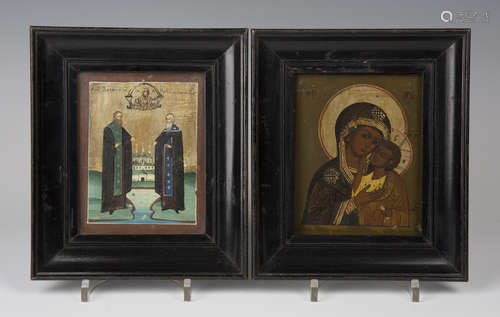 A 20th century Romanian icon depicting the Madonna and Child, painted and gilt on a softwood