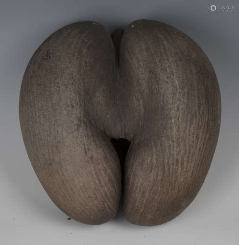 A mid-20th century coco-de-mer nut, 26cm x 25cm.Buyer’s Premium 29.4% (including VAT @ 20%) of the