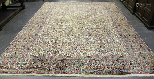 A Tabriz carpet, Central Persia, late 20th century, the ivory field with overall scrolling