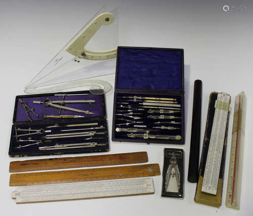 A late Victorian leather cased set of nickel technical drawing instruments, another partial set,