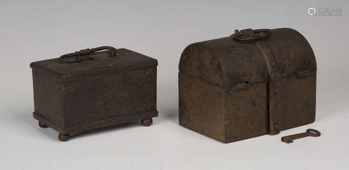 A 17th century Nuremberg ironwork casket, the domed lid with oval loop handle applied to a central