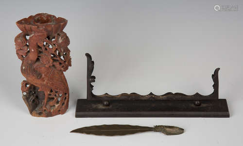 An early 20th century bronze letter opener, finely modelled in the form of a cicada eating a leaf,