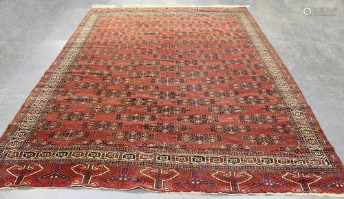 A Yomut carpet, West Turkestan, early 20th century, the claret field with overall offset rows of