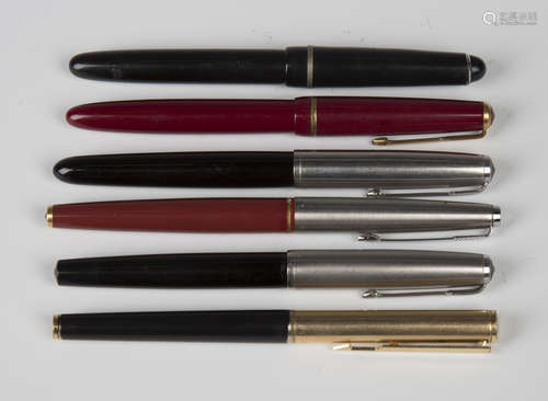 A group of six fountain pens, comprising five Parker pens and an Osmiroid 65, together with two