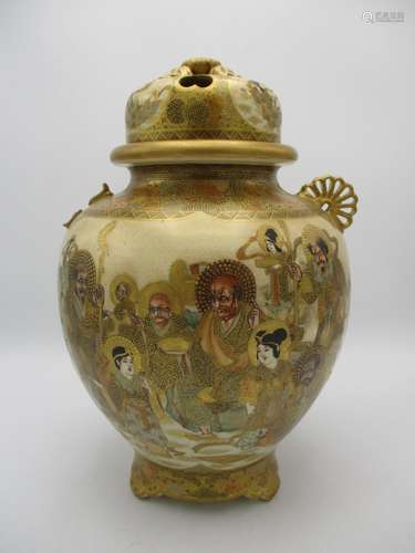 A Japanese Satsuma porcelain koro, of globular form with pierced lid, decorated throughout with