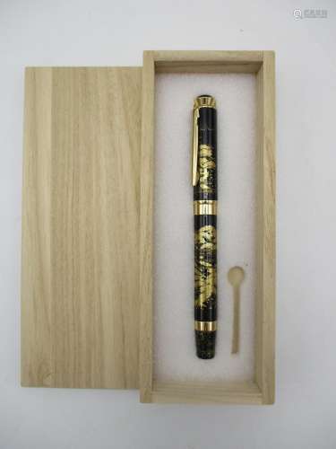 A Japanese Maki-e style fountain pen, elaborately decorated with a lacquer design of Autumnal