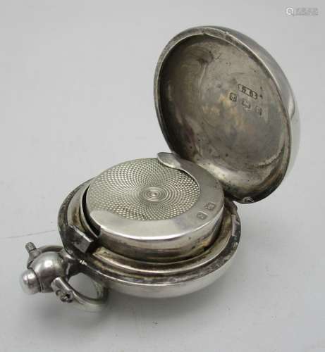 An Edward VII silver sovereign holder by Samuel M. Levi, Birmingham 1906, with engraved monogram