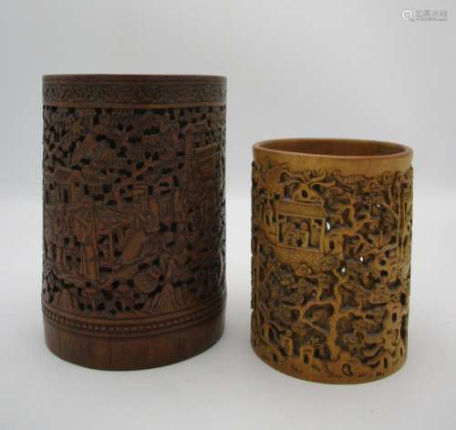 A Chinese Qing dynasty carved bamboo brush pot, the front with carved figural scene flanked either