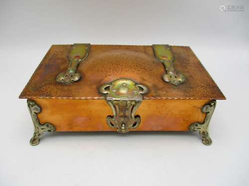 A fine Arts and Crafts silver mounted copper box, the silver hallmarked by R H Halford & Sons,