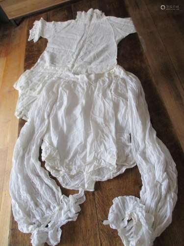 A group of 19th and 20th century ladies clothing to include a white cotton blouse with detachable
