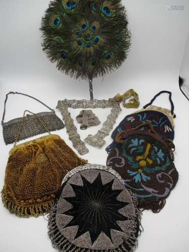 A group of early 20th century beaded evening bags, a silver coloured chain evening bag, together