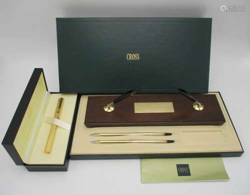 A Dunhill Gemline Classic gilt fountain pen with 14ct gold nib in Dunhill box, together with a Cross