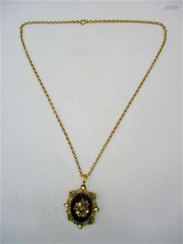 A late Victorian 9ct gold pendant brooch with central hardstone cabochon, designed with pierced