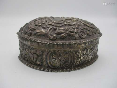 A Victorian silver table box by Horton & Allday, Birmingham 1888, almond shaped with repousse