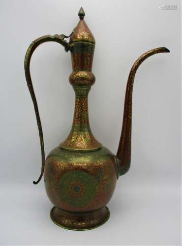 A large Persian kahmiri enamelled brass ewer, extensively decorated with red ground enamel and